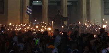 Young Cuban People participate in the  torchlight march